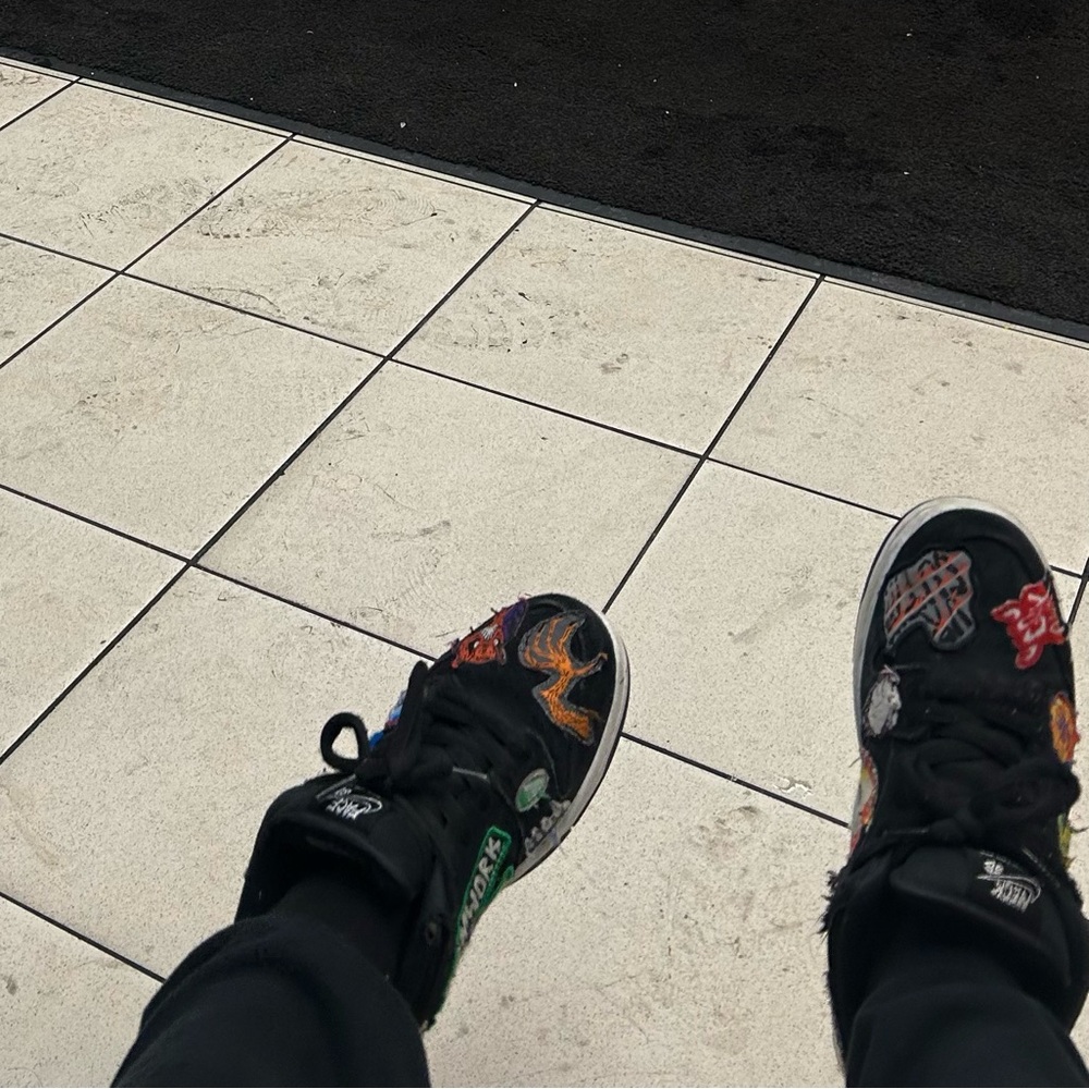 Nike Kids Black Sneakers with Vibrant Accents